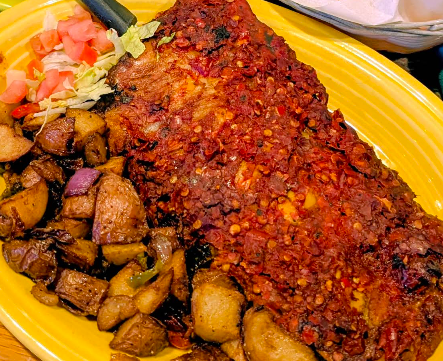 El Pinto Restaurant & Cantina signature dishes Red Chile Ribs
Chicken Enchiladas Plate
Green Chile Strips